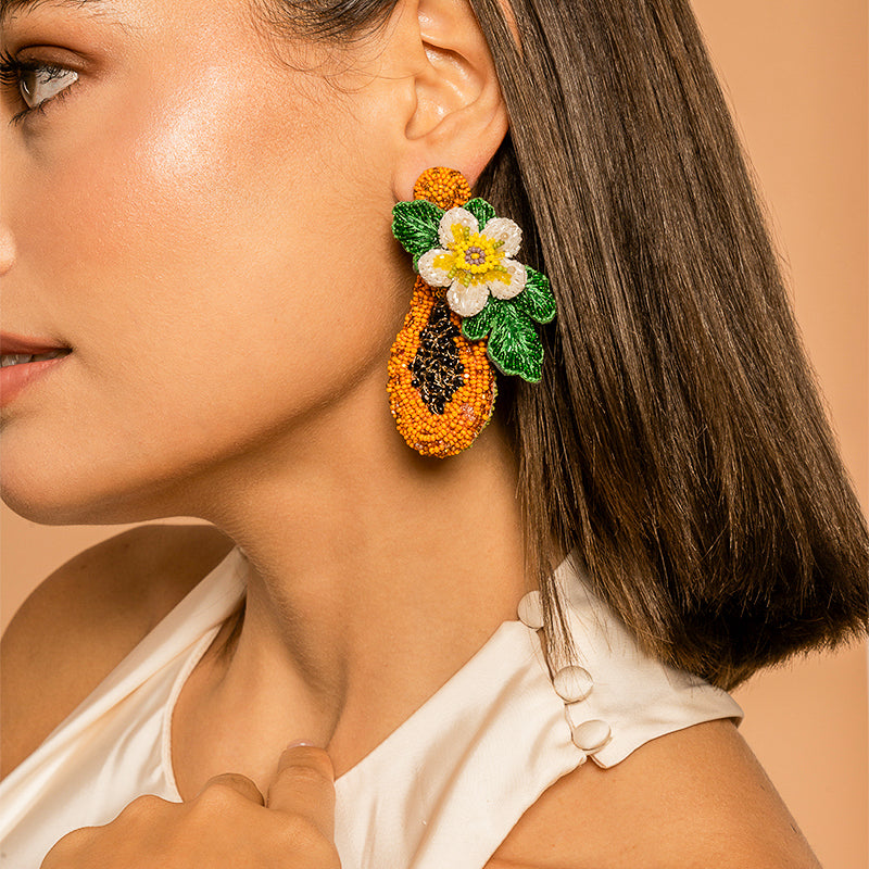 Model Wearing Deepa Gurnani handmade Papaya Earrings in Orange color