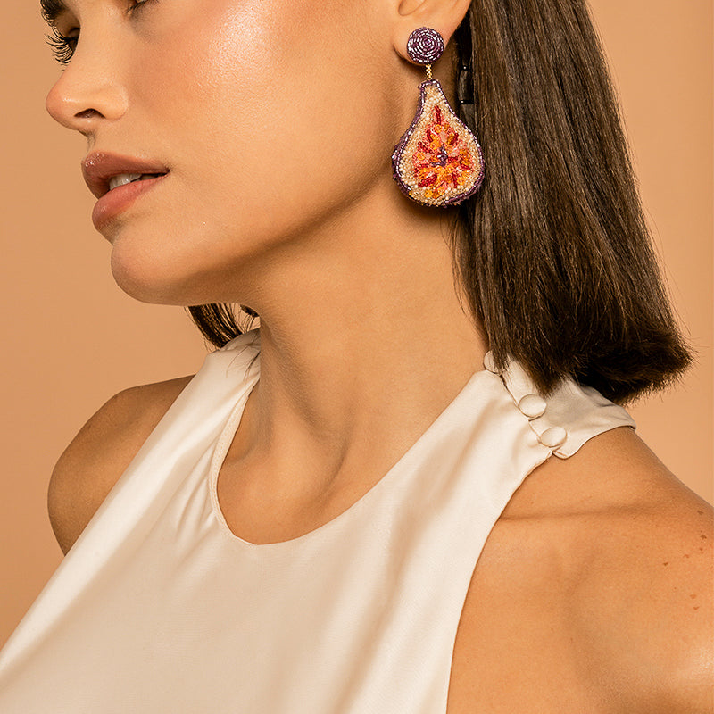 Model Wearing Deepa Gurnani handmade Fig Earrings in Purple color