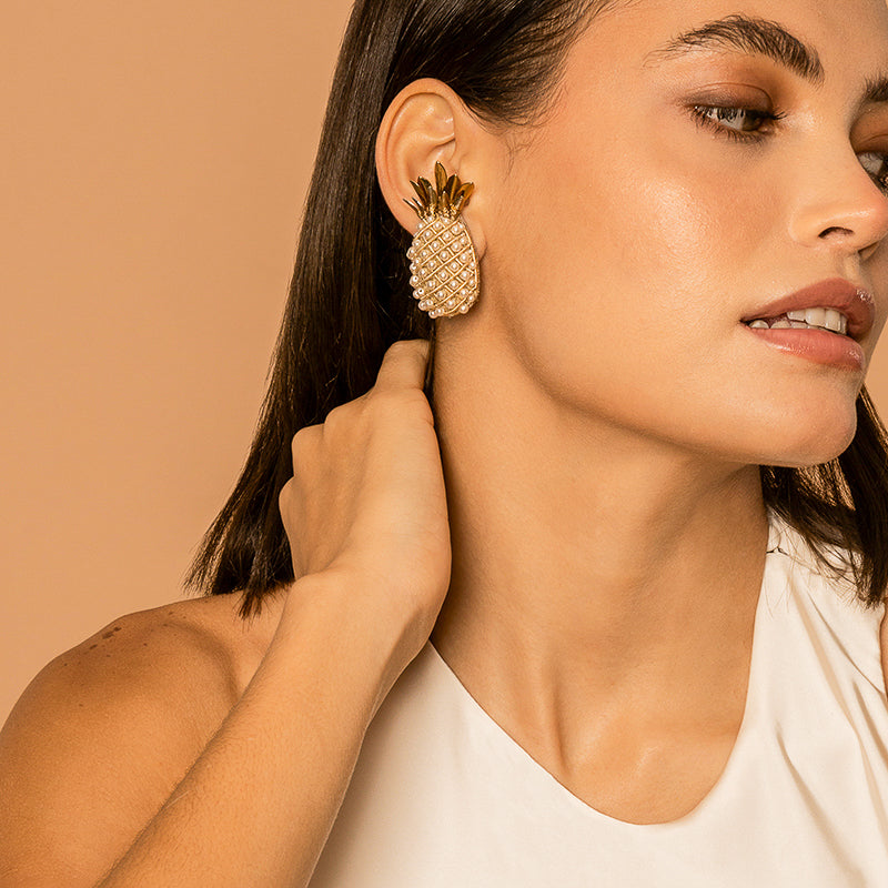 Model Wearing Deepa Gurnani handmade Pineapple Earrings in Gold color