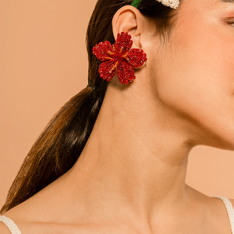 Model Wearing Deepa Gurnani handmade Hibiscus Earrings in Red color