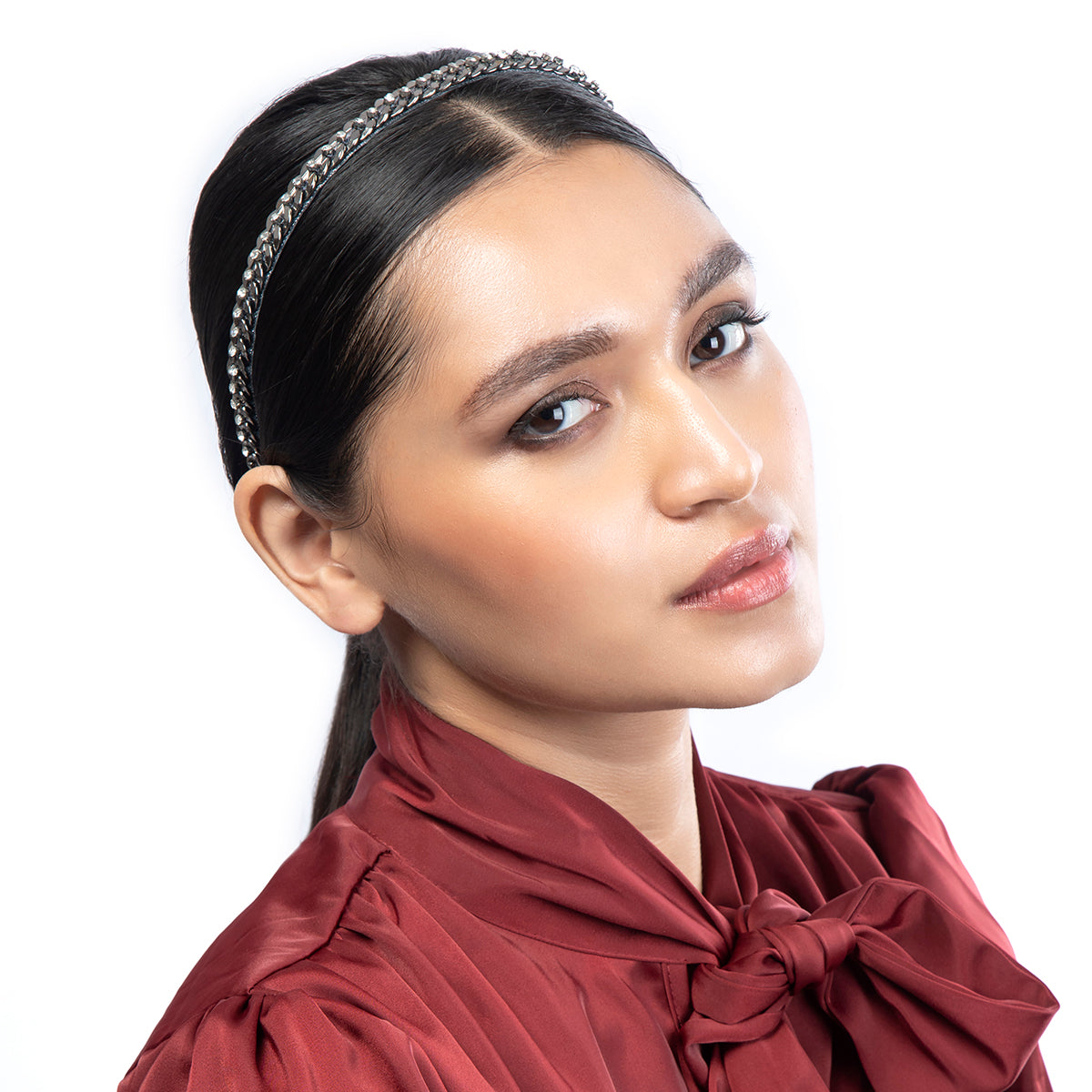 Model wearing Deepa by Deepa Gurnani Handmade Chainey Headband in Gunmetal color