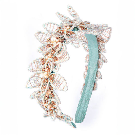 Deepa Gurnani handmade the Suvi headband in baby blue color