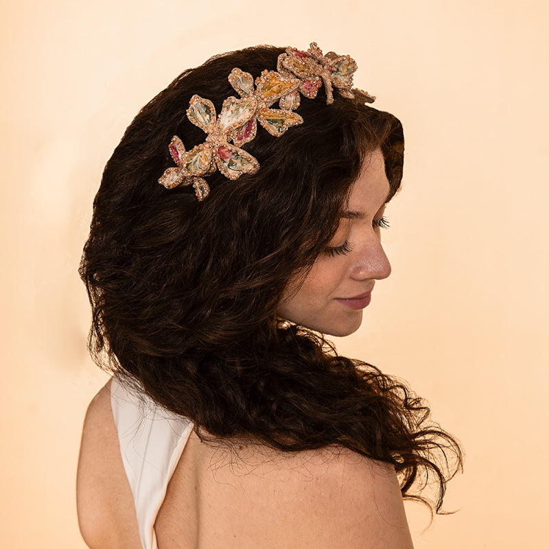 Detail of Model wearing  Deepa Gurnani handmade the Apollo headband in Beige color