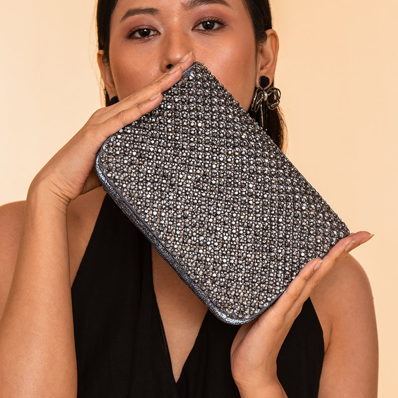 Model Carrying Deepa Gurnani Handmade Aime Clutch In Gunmetal Color