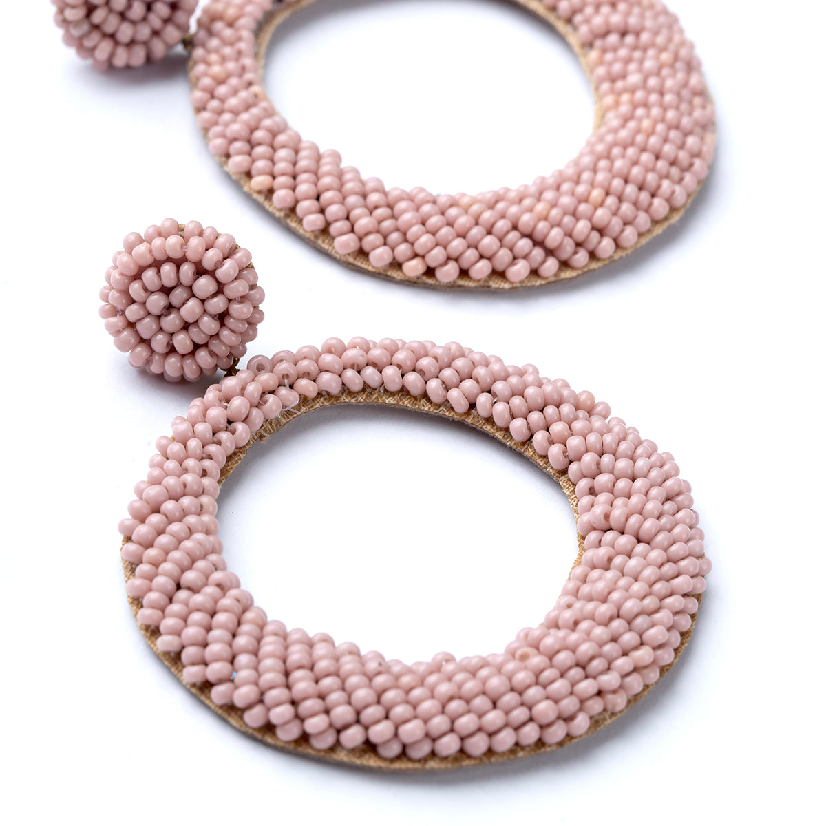 Close up of Asta Earrings in Dusty Pink