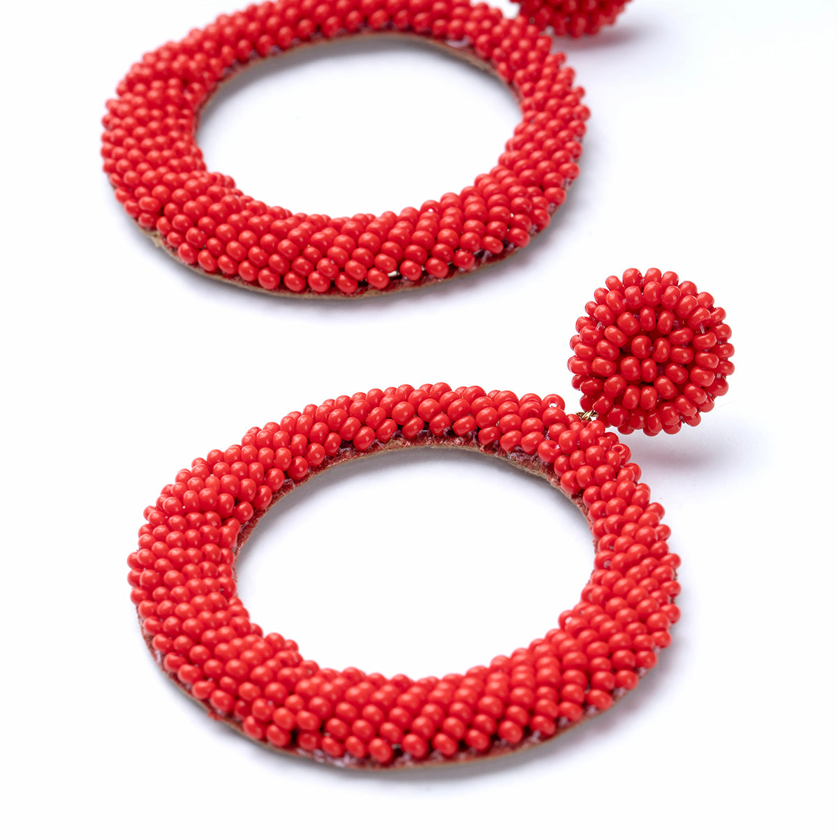 Close up of Asta Earrings in Red