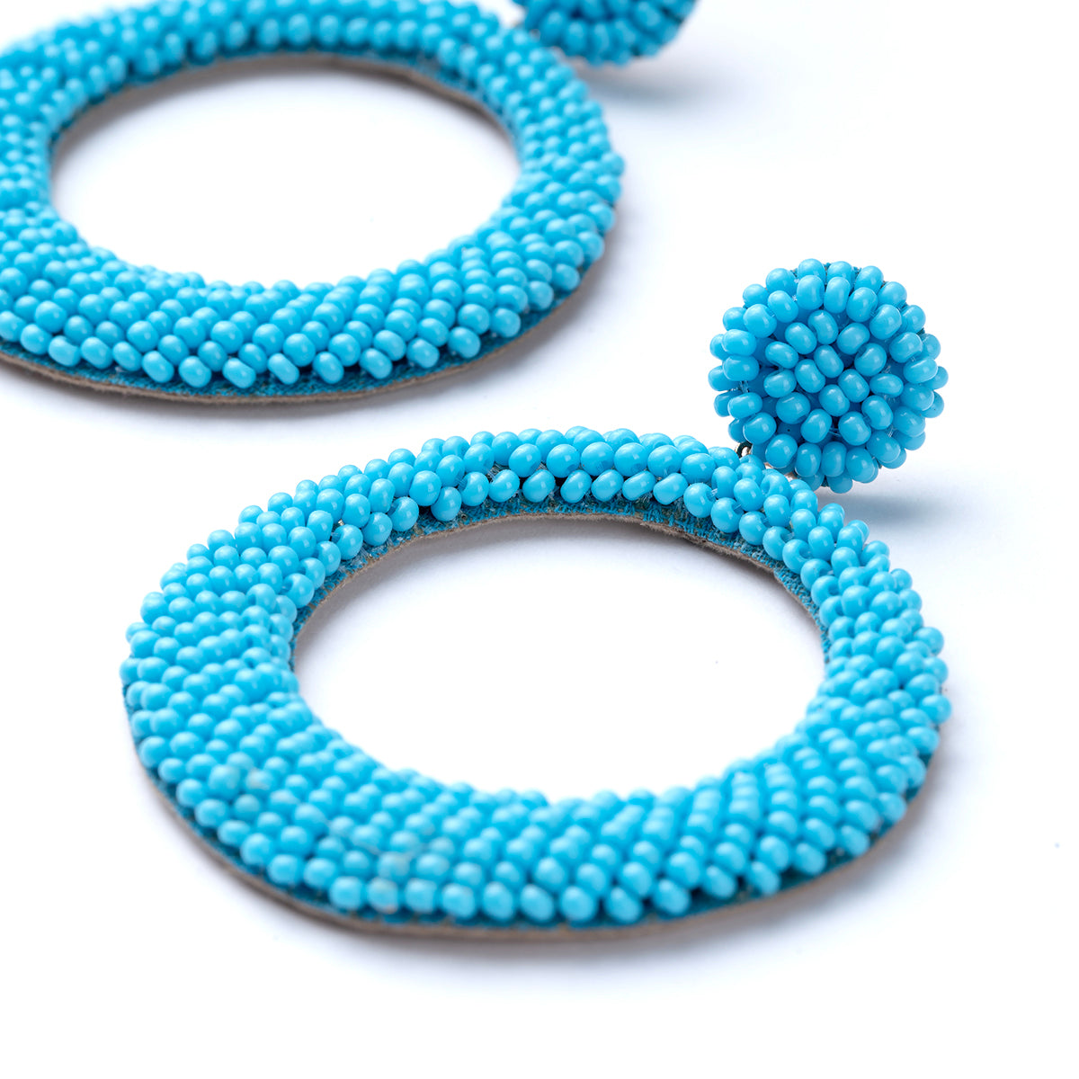 Close up of Asta Earrings in Turquoise