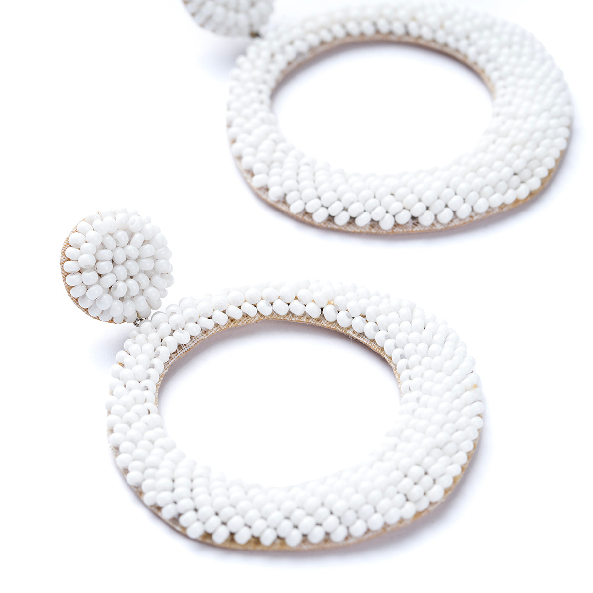 Close up of Asta Earrings in White