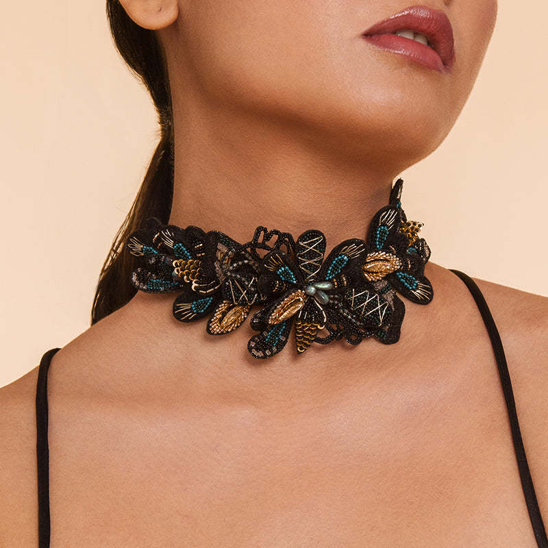 Detail of Model wearing Deepa Gurnani Handmade Black Zosia Necklace