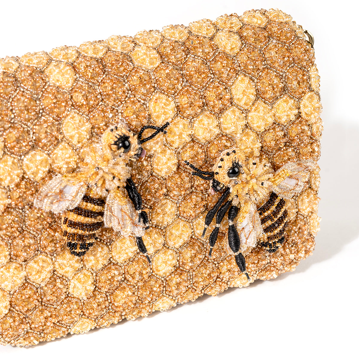 Detail of Deepa Gurnani Honeybee clutch in yellow color