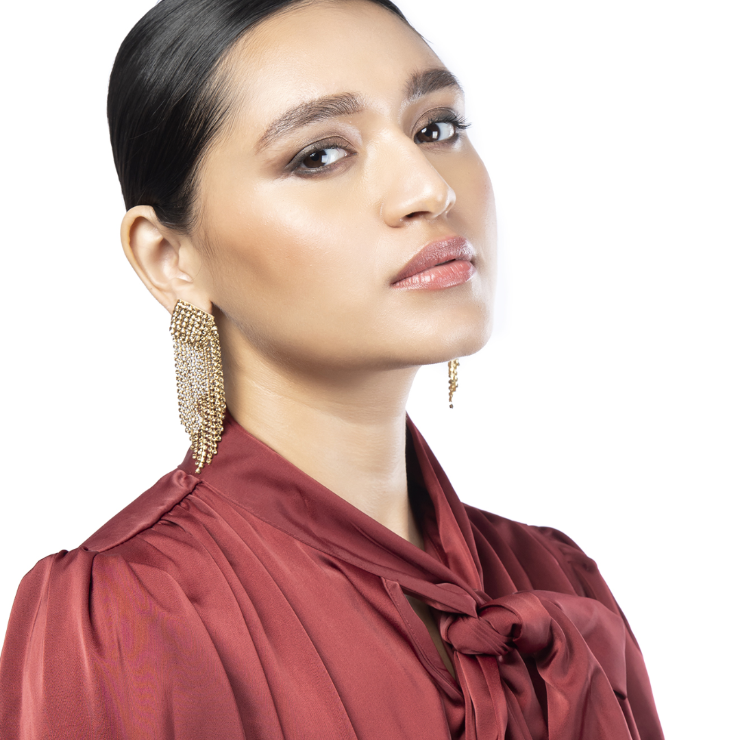 Model wearing Deepa By Deepa Gurnani Niomi Earrings in Gold