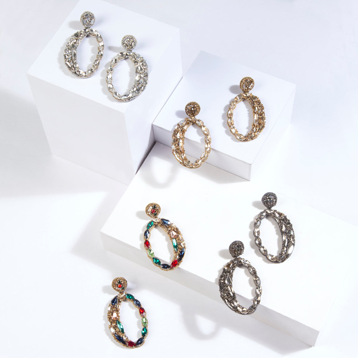 Freida crystal post earrings in silver, gold, multicolor and gunmetal.