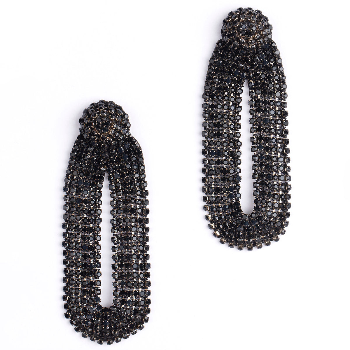 Our light weight Shyna Earrings are handmade with glass crystals in an oval drop shape.