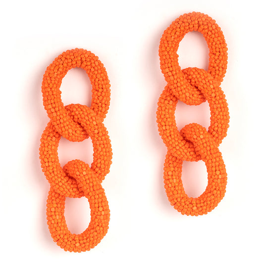 Handmade Deepa Gurnani three link Linka Earrings in Orange.