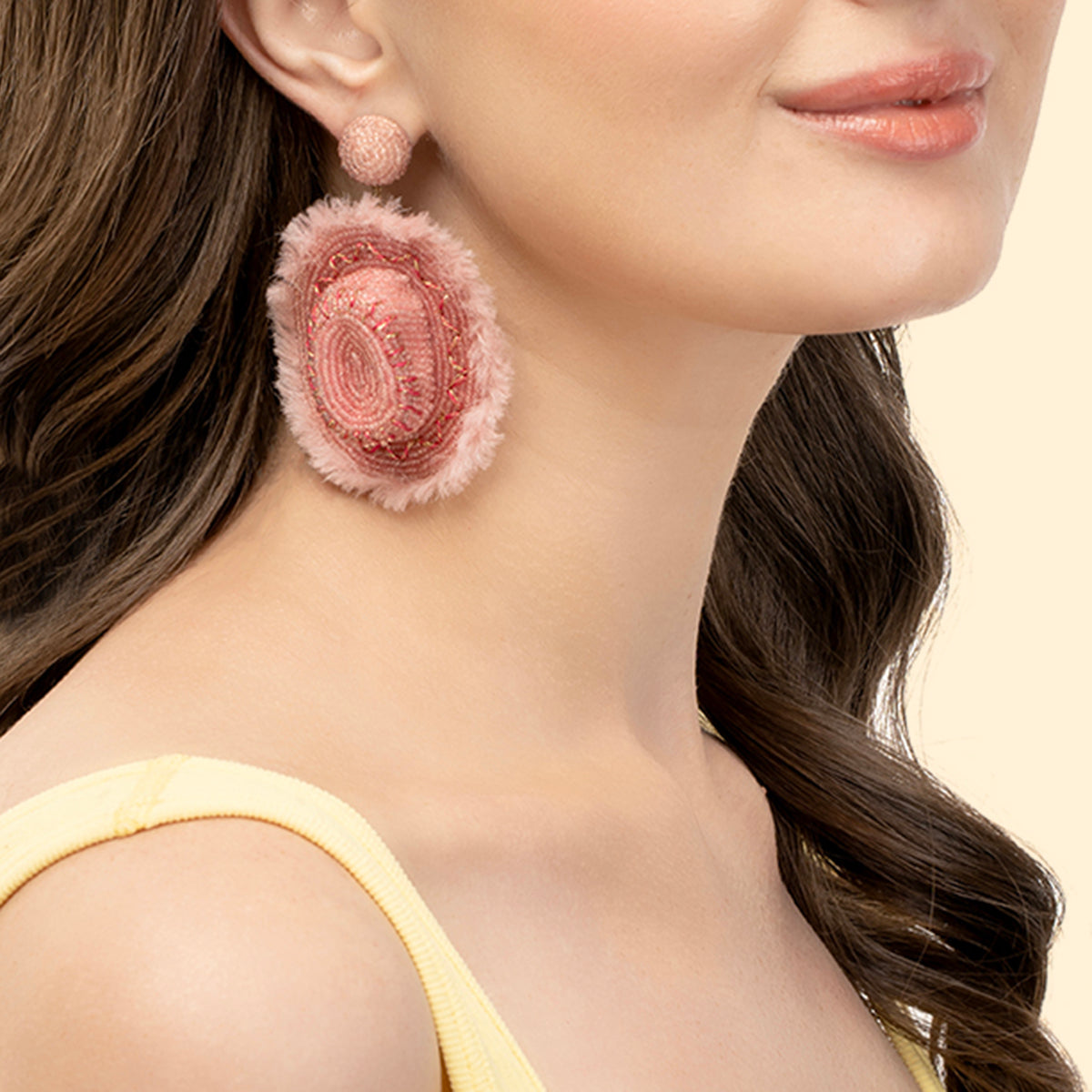 Model wearing Deepa Gurnani Handmade Pink Cowboy Earrings