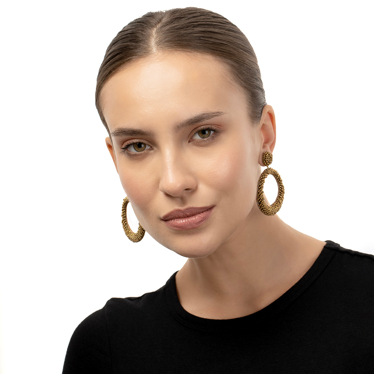 Model wearing our Deepa by Deepa Gurnani Handmade Gold Asta Earrings